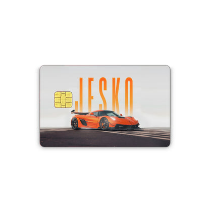 Card with an orange sports car and 'LESKO' branding on a white background